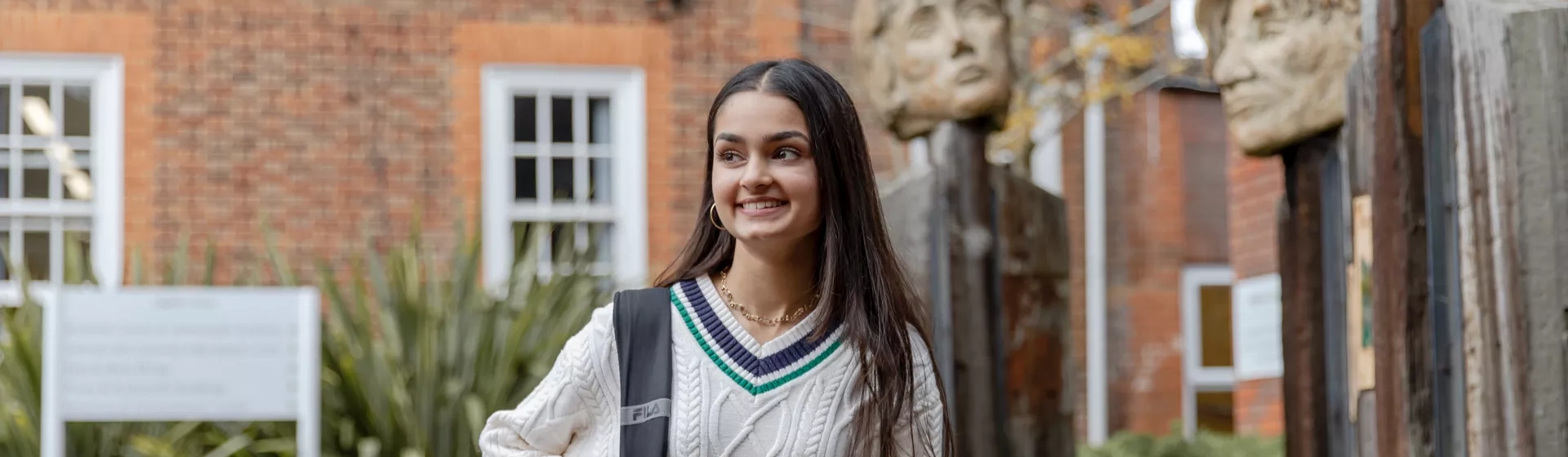 Female student outside County building